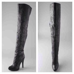 Thigh-high Report boots